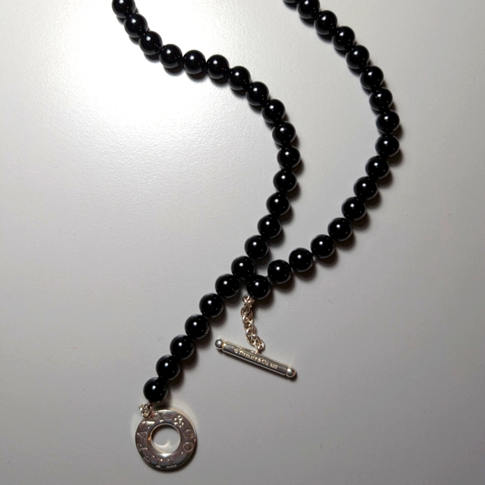 Tiffany & Co. Black Bead Necklace with Silver Clasp.